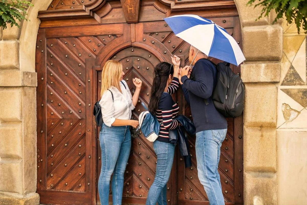 a group of people standing in front of a wooden door