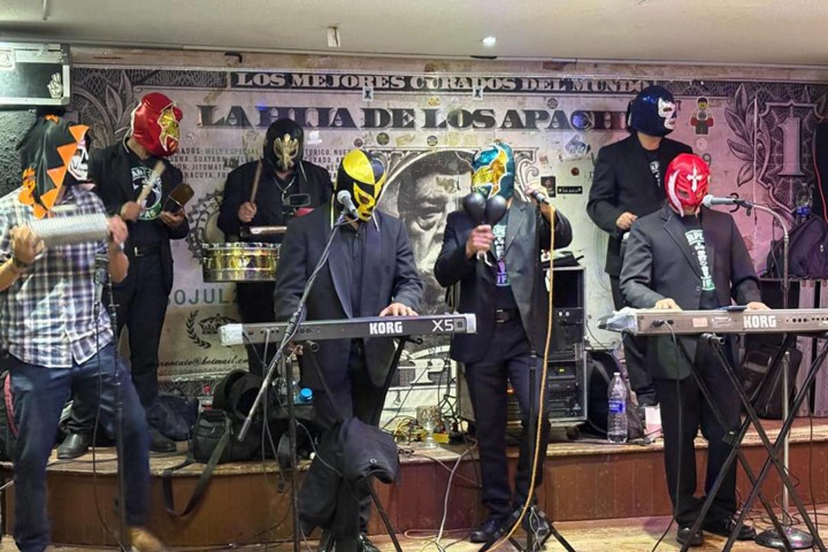 a group of people playing music on a stage