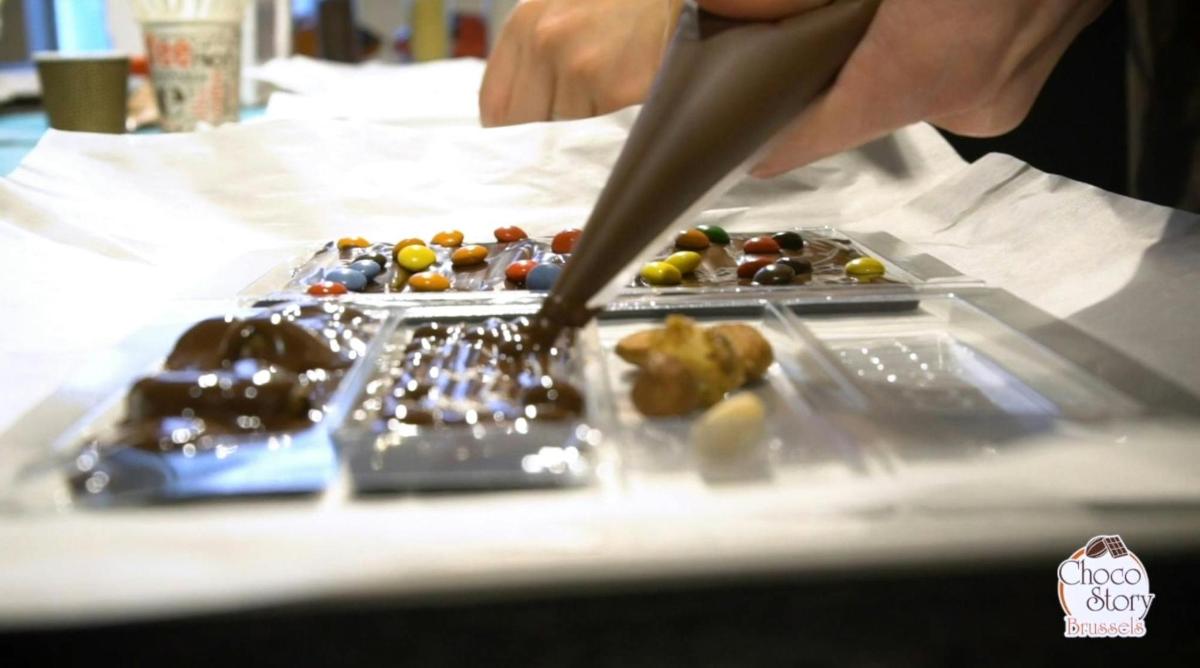 a person cutting a plate of food with a knife