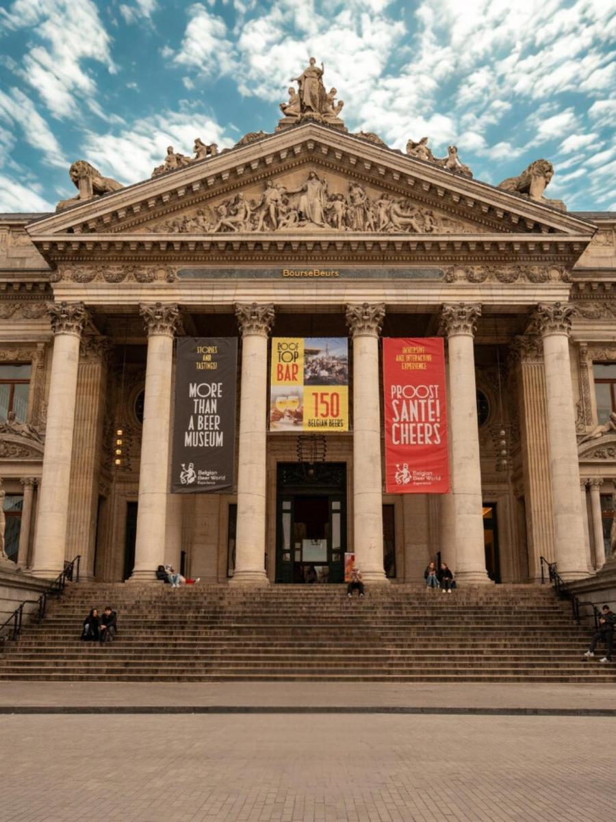 a large building with stairs in front of it