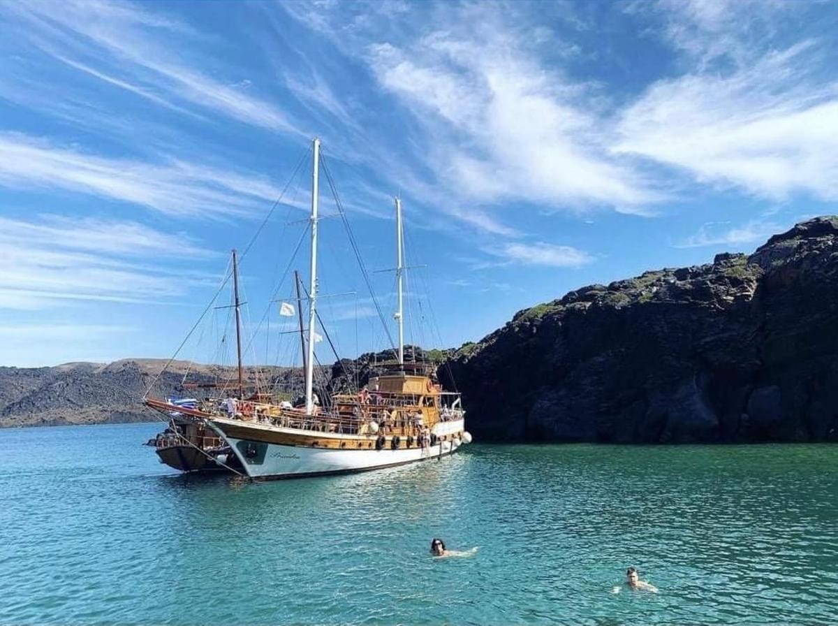a boat in a body of water with people in it