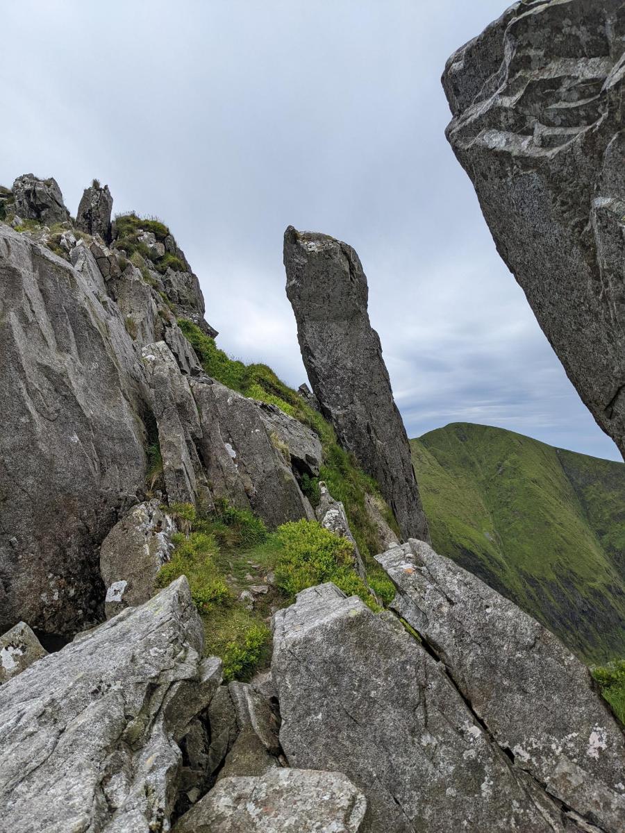 a group of rocks on the side of a mountain