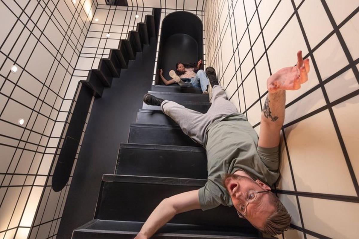 a man on an escalator in a building