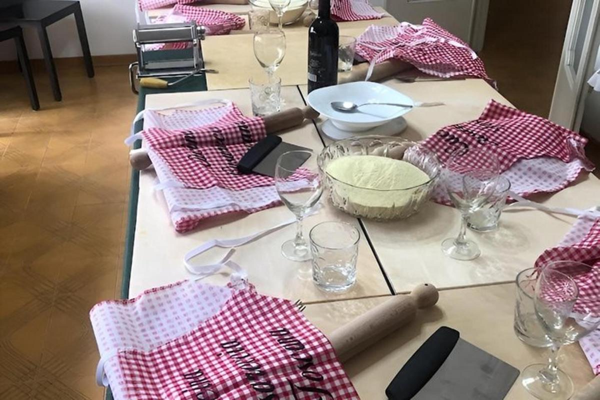 a table with a red and white checkered table cloth