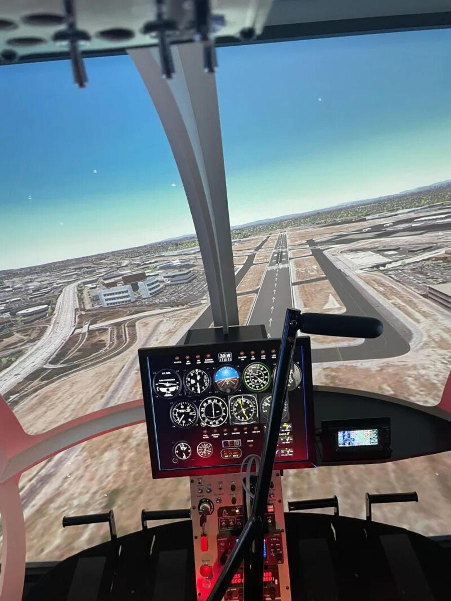 a view of an airport runway from the cockpit of an airplane