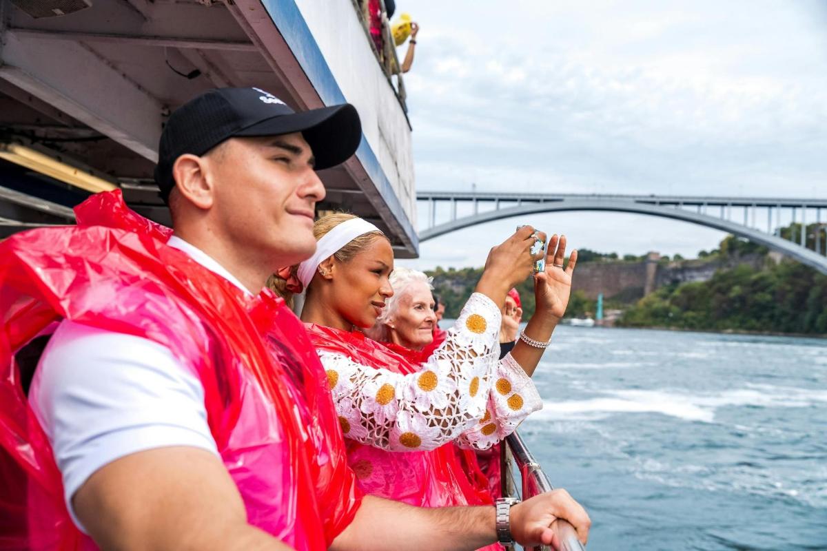 a group of people on a boat in the water