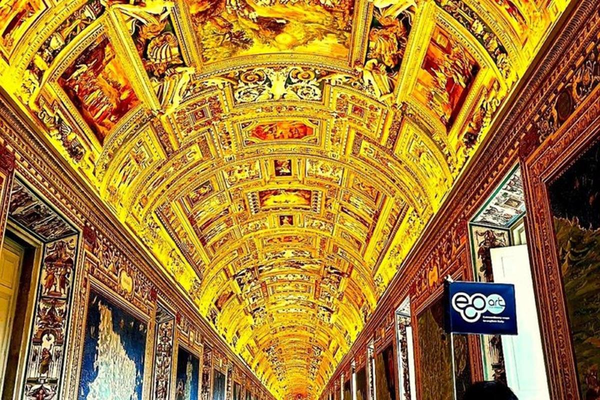 a room with a ceiling with paintings on it
