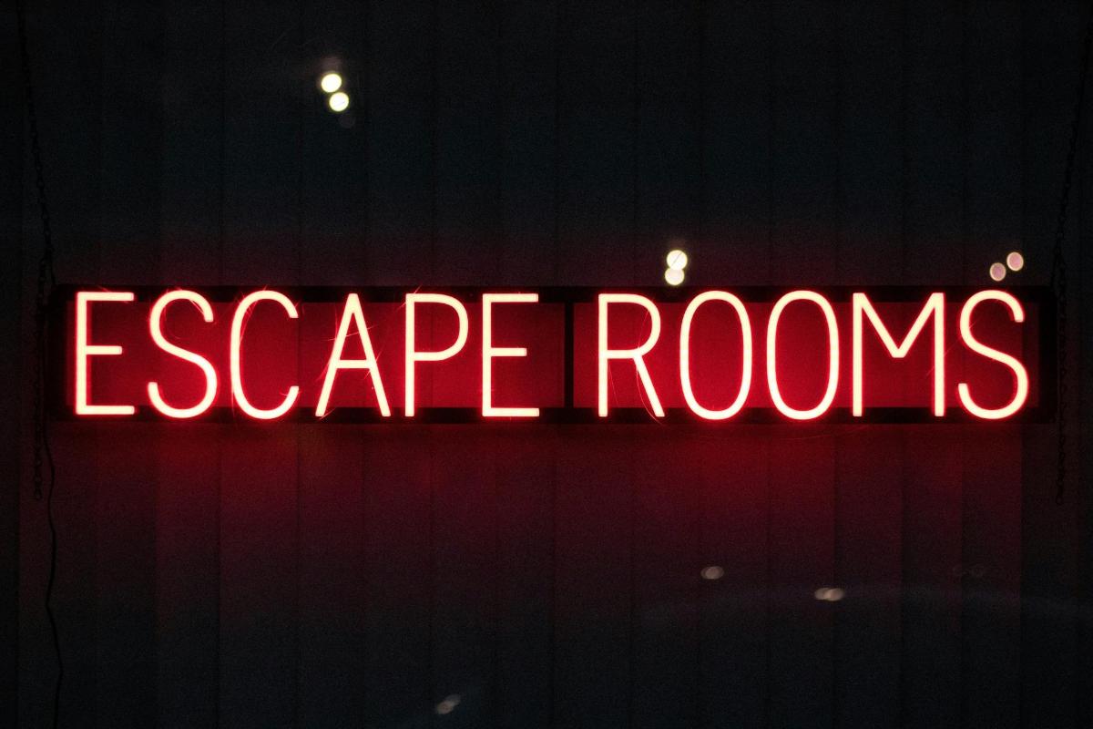 a neon sign in the window of a store