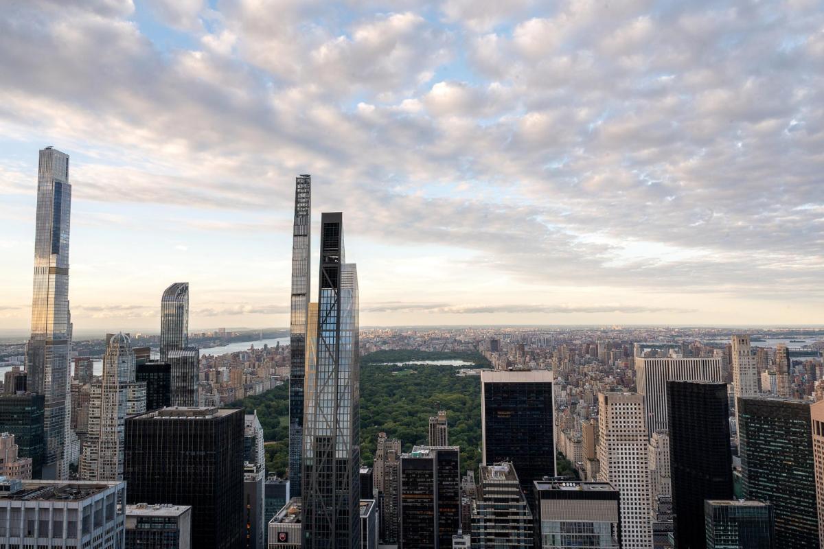 a view of a large city with tall buildings