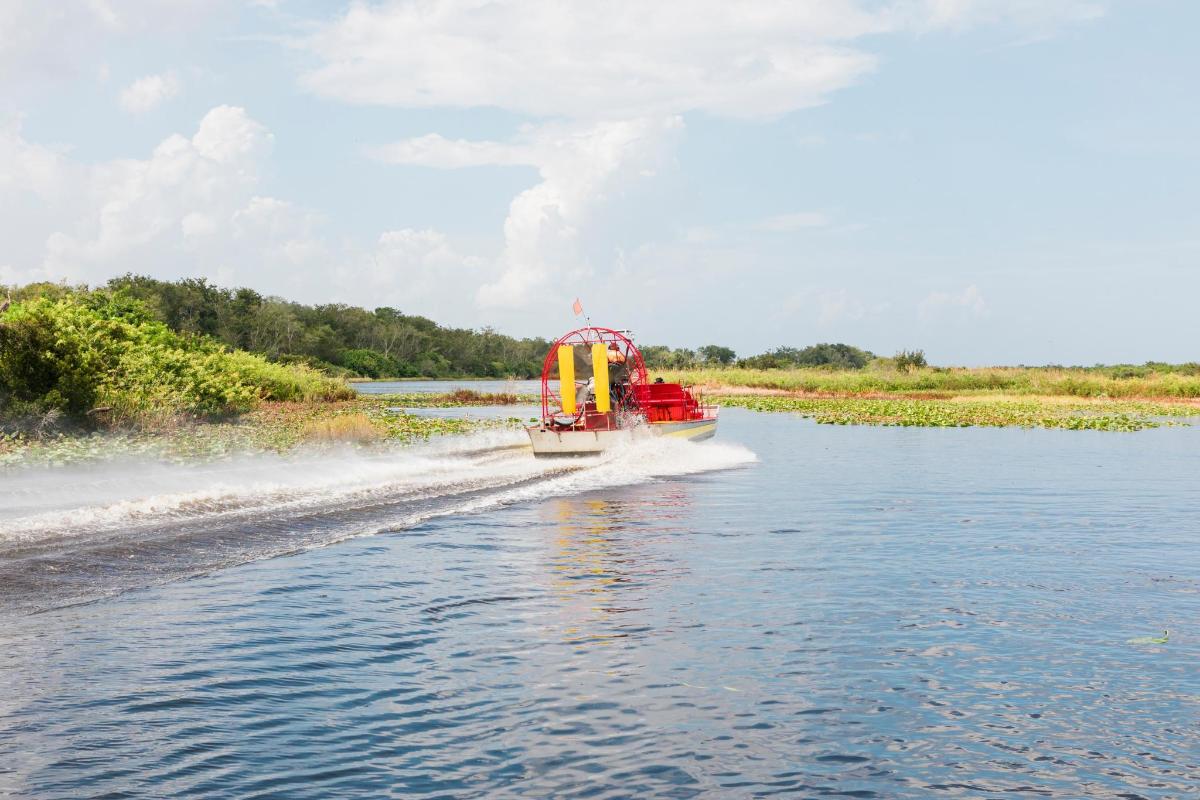 a boat on the water on a river