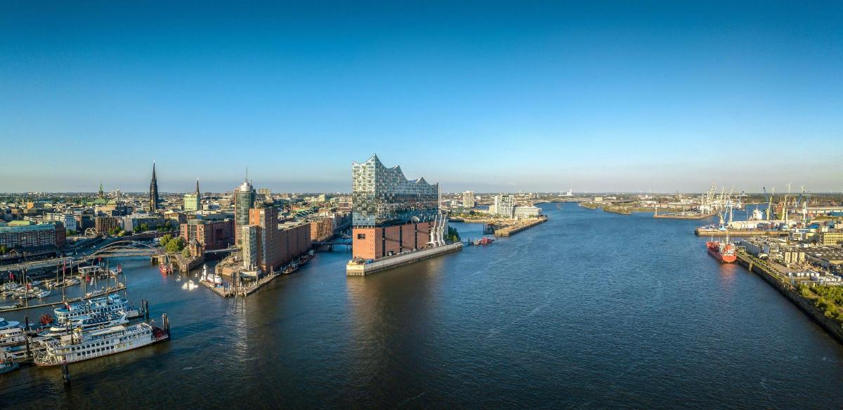 an aerial view of a river in a city