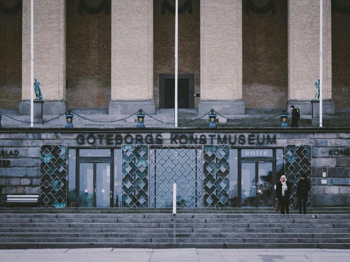 a person standing in front of a building