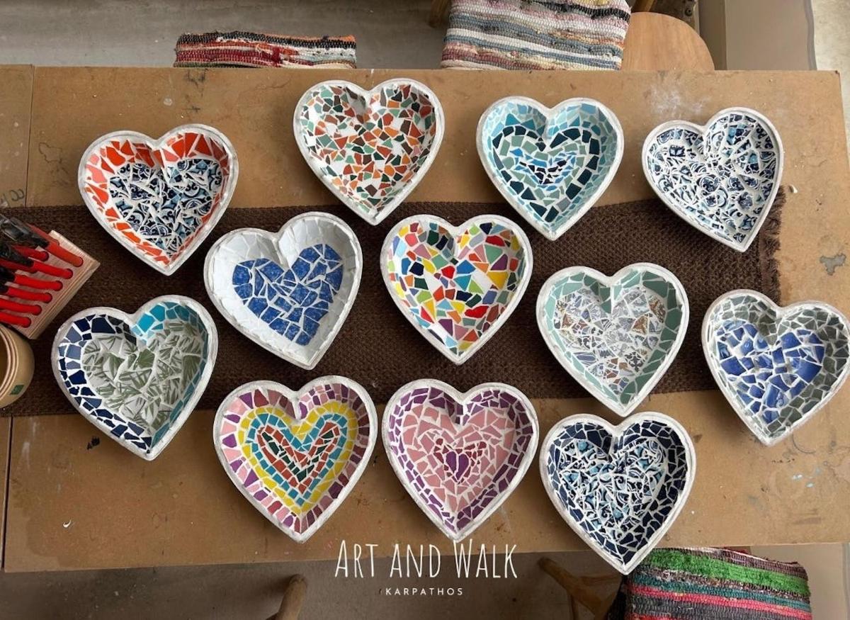 a group of hearts painted on a wall