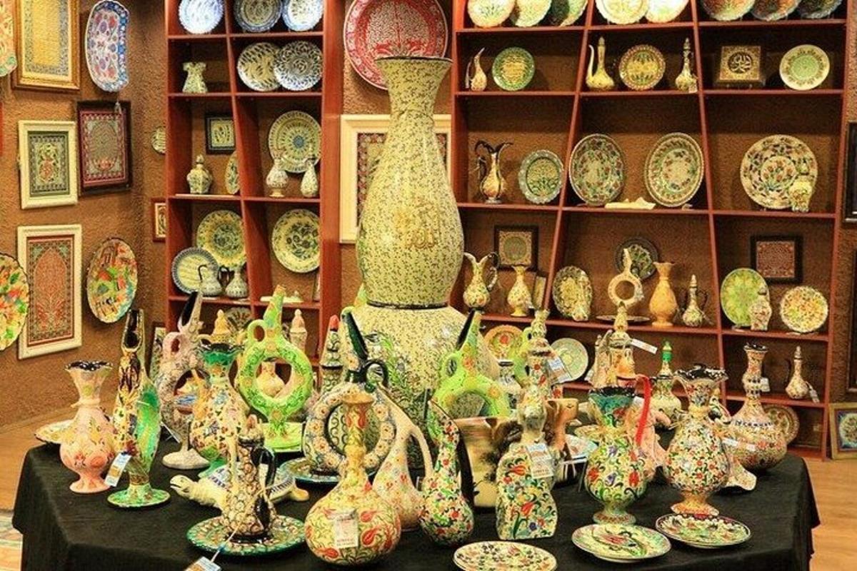 a display of vases and plates on a table