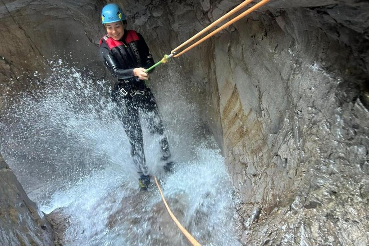 a man is on a rope in the water