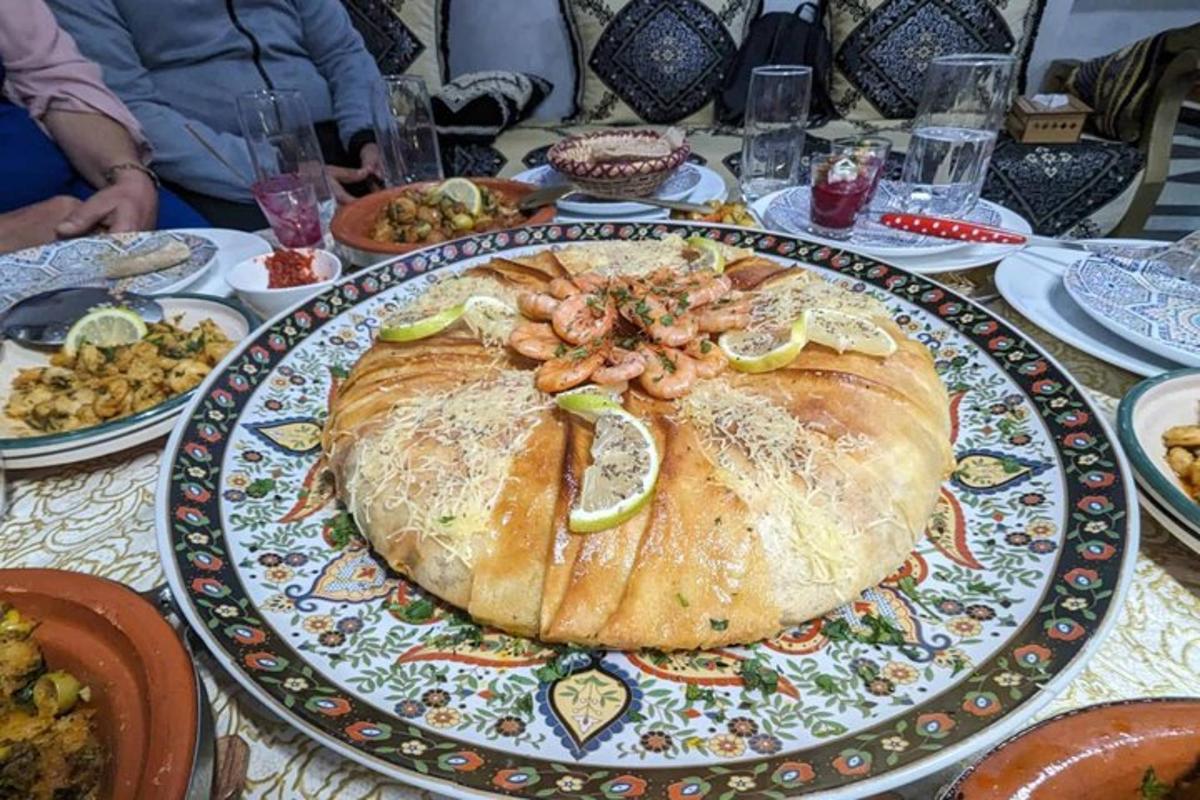 a large turkey on a table with plates of food