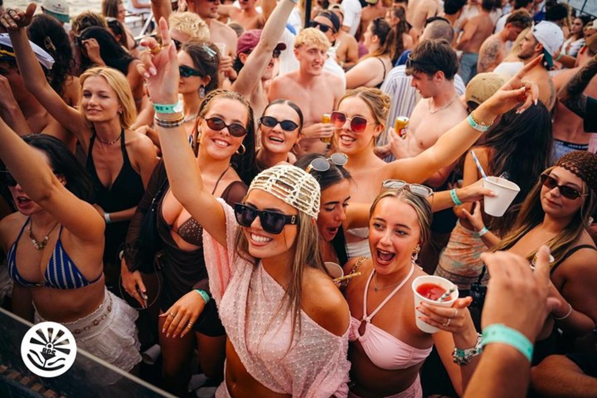 a crowd of people in bathing suits at a concert