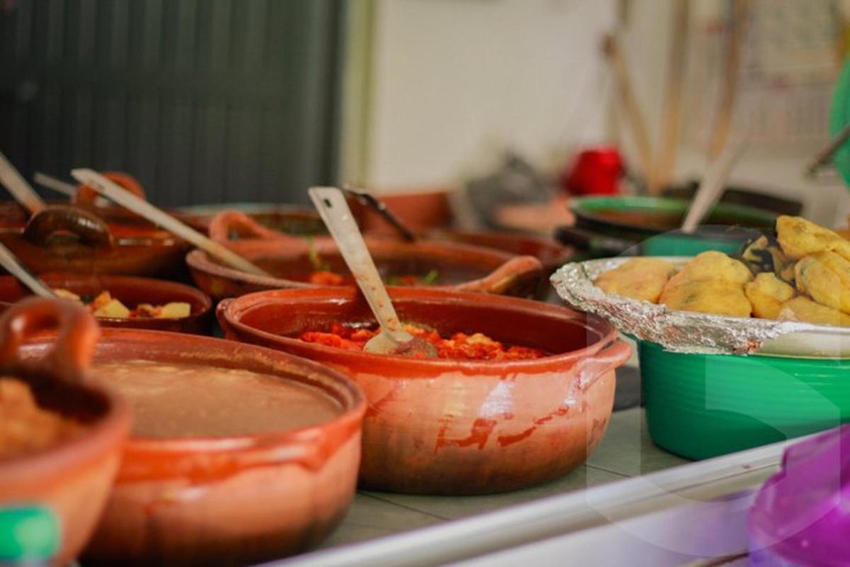 a group of bowls of food on a counter