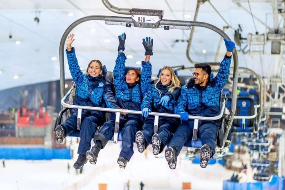 a group of people riding a ski lift