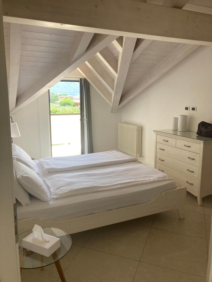 Letto o letti in una camera di Arcovacanze