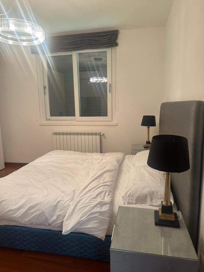 Letto o letti in una camera di Pool Apartment Bellagio