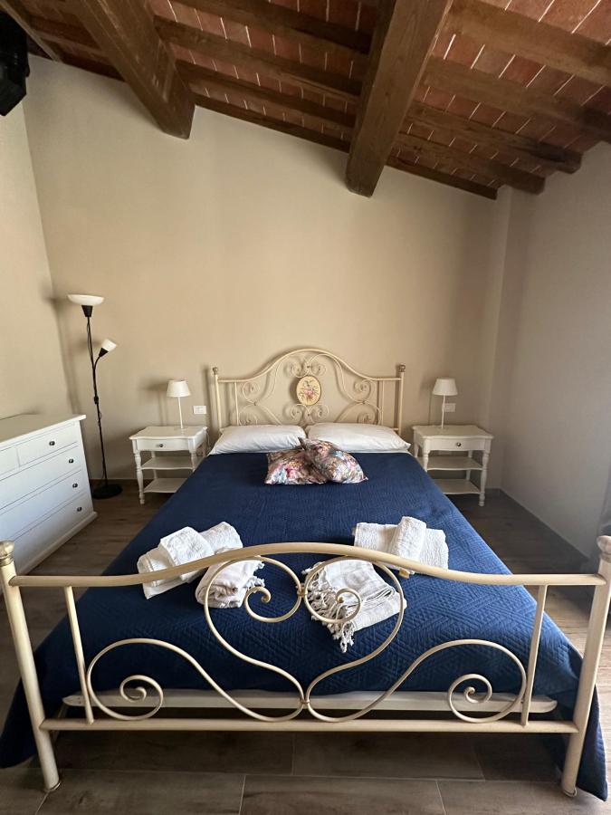 Letto o letti in una camera di La casa delle Rondini