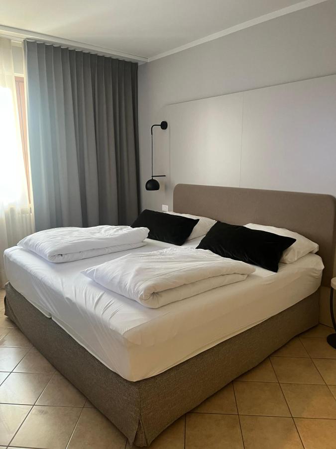 Letto o letti in una camera di June Stay Lake Garda