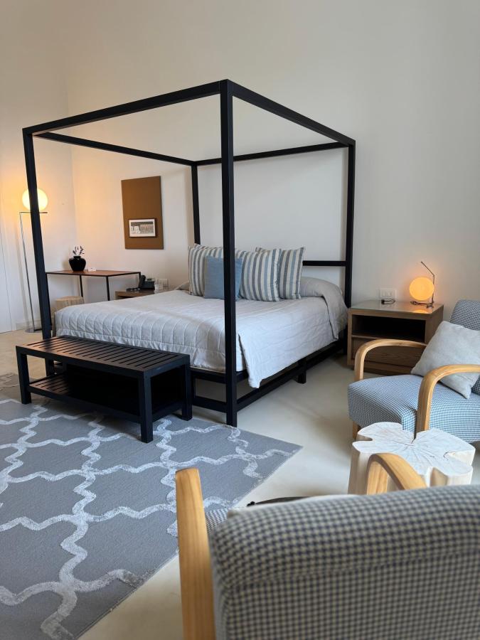 Letto o letti in una camera di Villa Torre Bianca by Emily Hotels