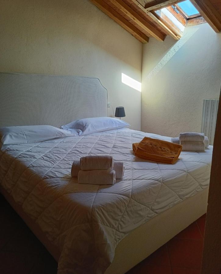 Letto o letti in una camera di Castello di Bossi