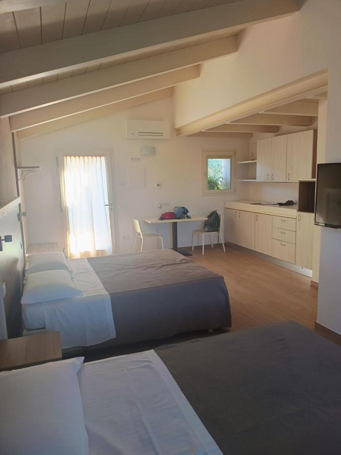 Letto o letti in una camera di Terra Fina