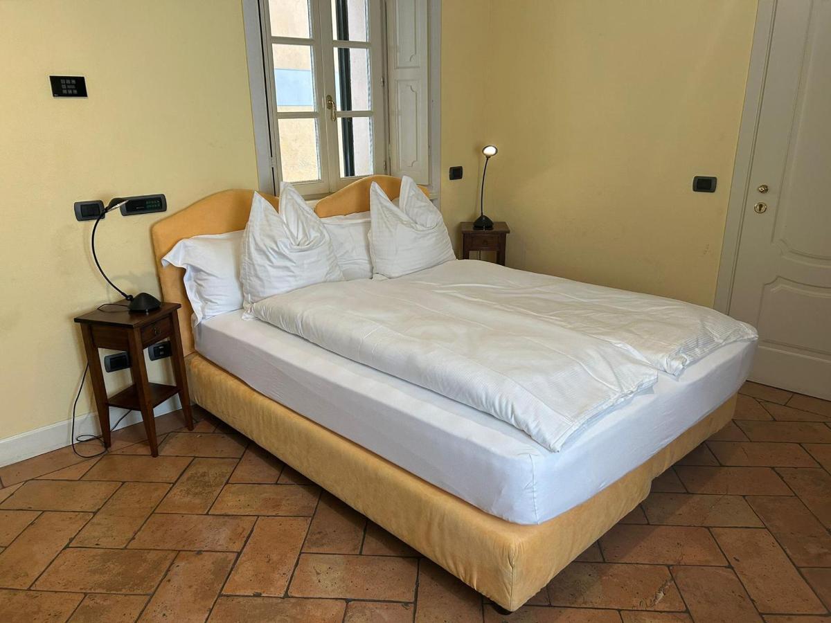 Letto o letti in una camera di Relais Villa Margherita