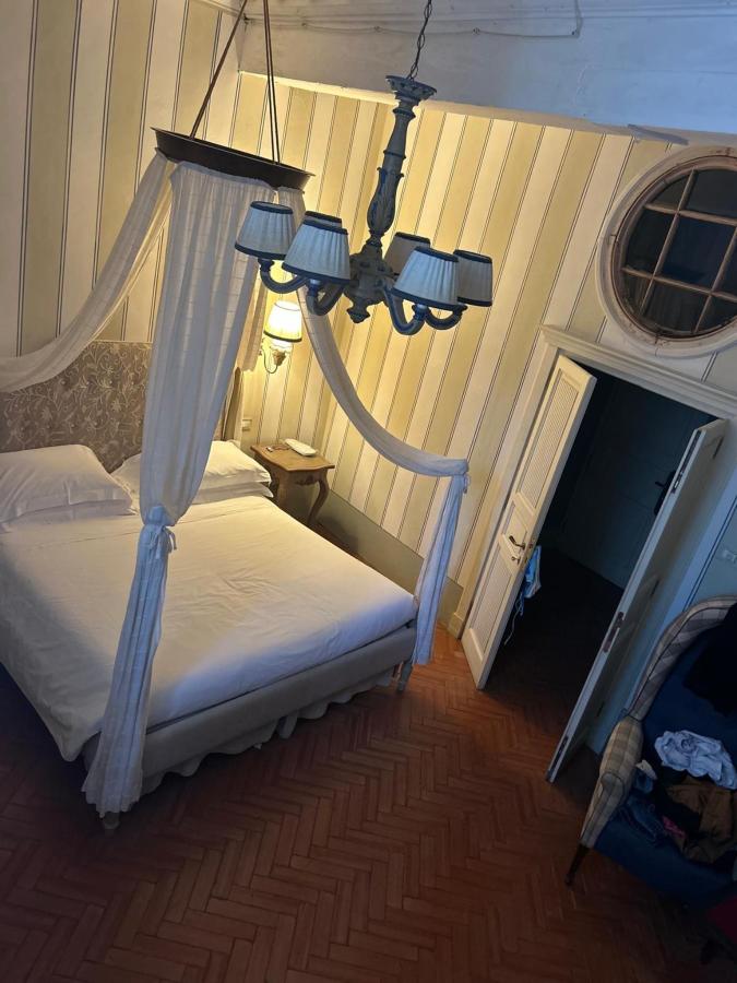 Letto o letti in una camera di Villa Bordoni