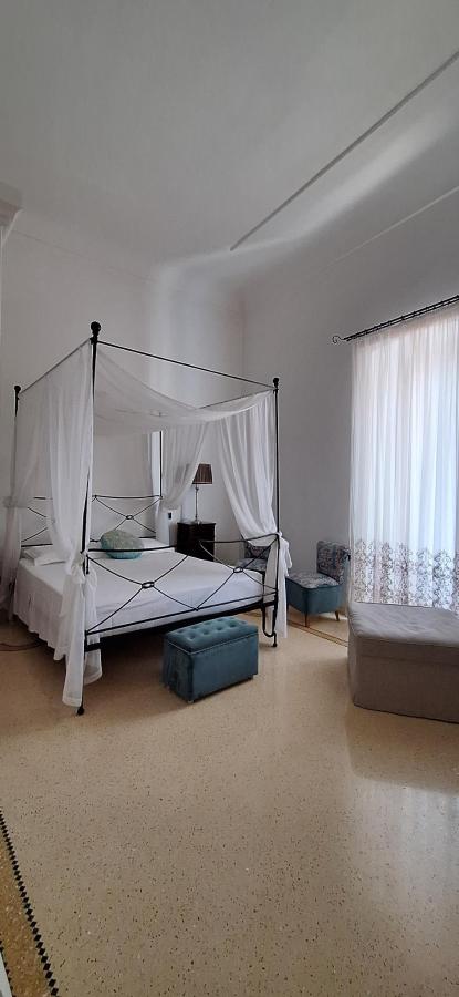Letto o letti in una camera di Palazzo Casto Relais