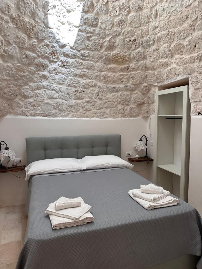 Letto o letti in una camera di Trulli e Frasche