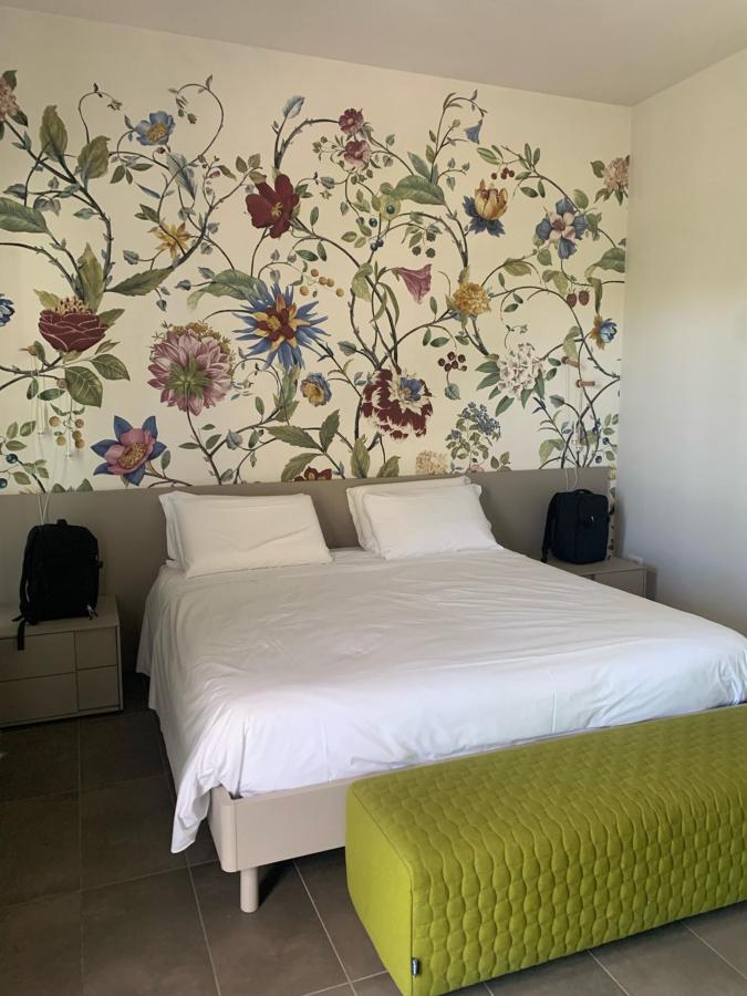 Letto o letti in una camera di DEL CARMINE AGRIRESORT- ex a3passi