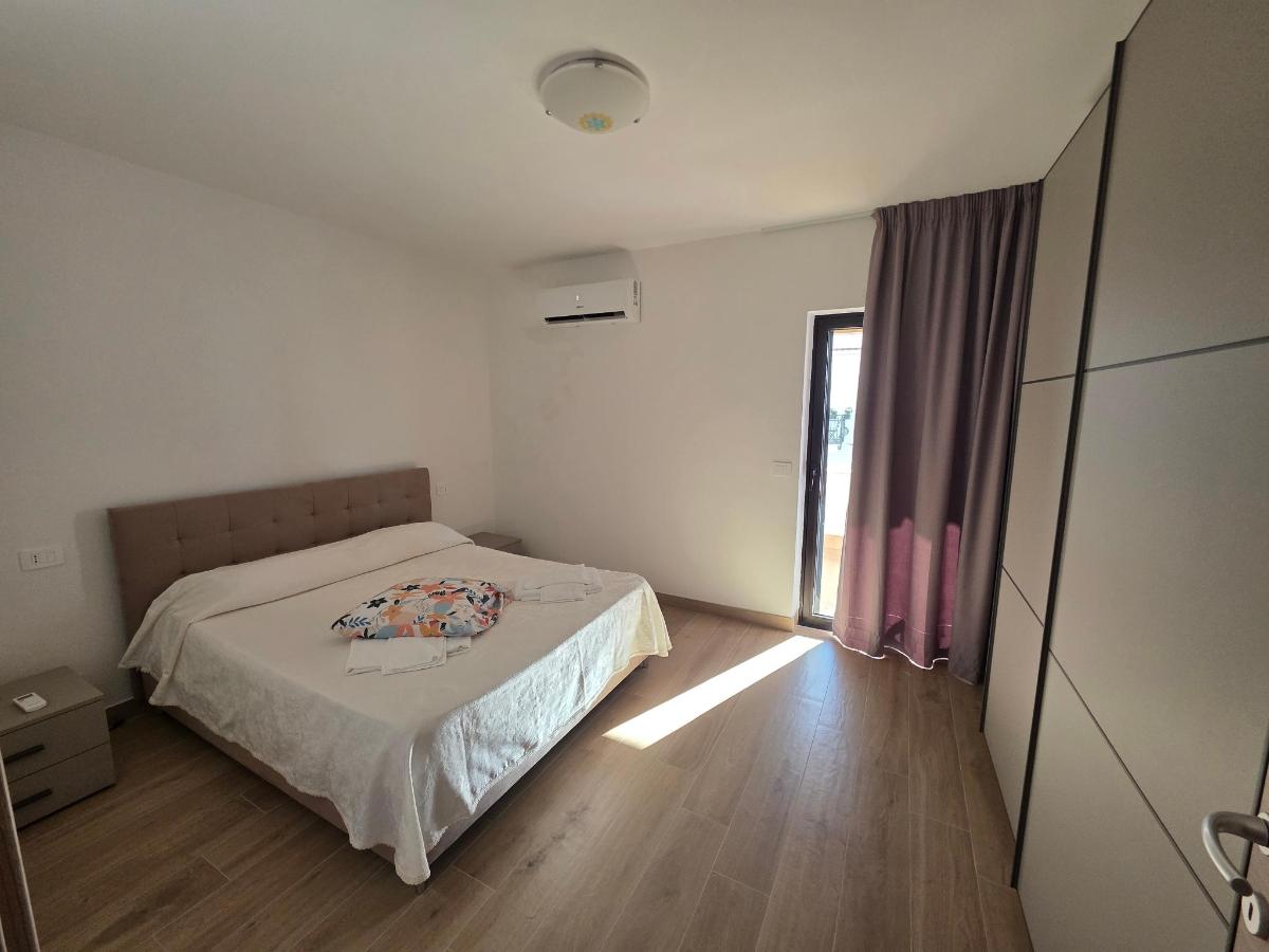 Letto o letti in una camera di Timiama Hotel & Apartments