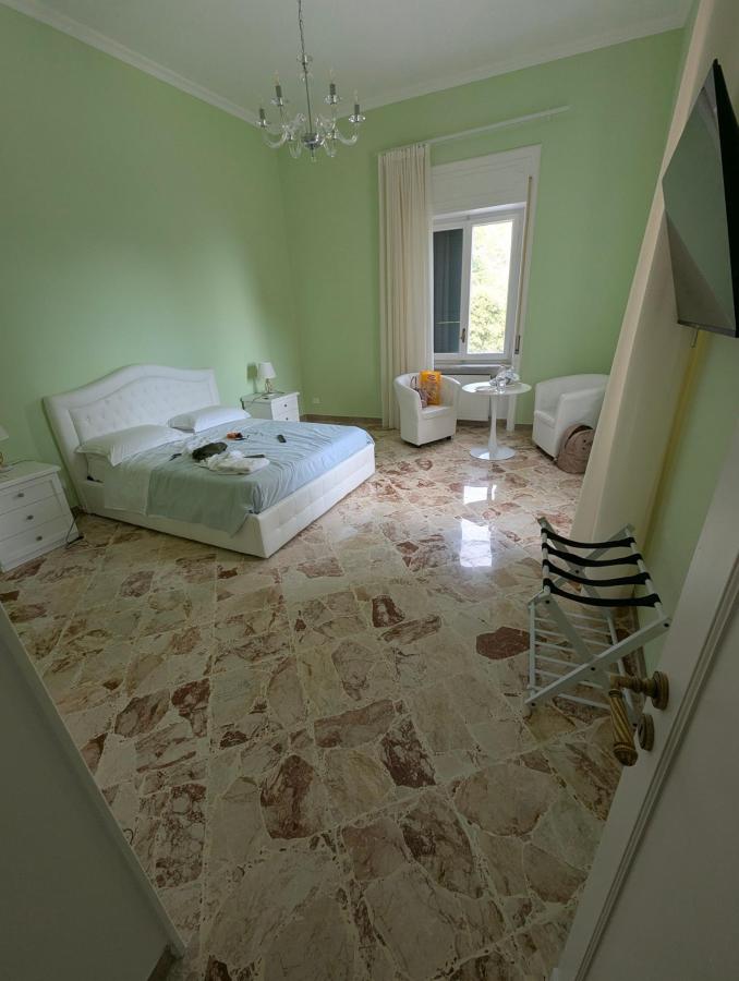 Letto o letti in una camera di VILLA ESMERALDA
