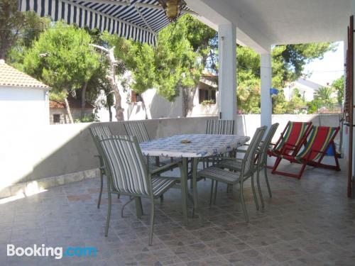 Apartment with terrace in Maslinica.