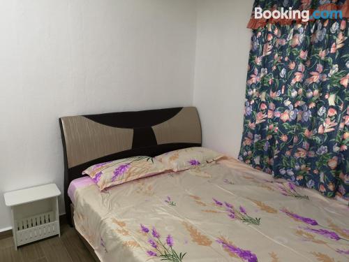 Stay cool: air-con apartment in Tanjong Tokong with wifi.