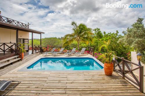 Apartment with air with terrace and swimming pool.