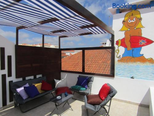 Appartement met terras. Areia Branca is votrer!