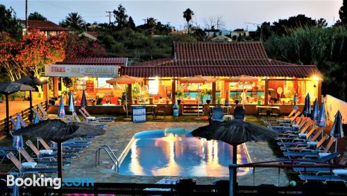 Tiny place in Agios Georgios with terrace and pool