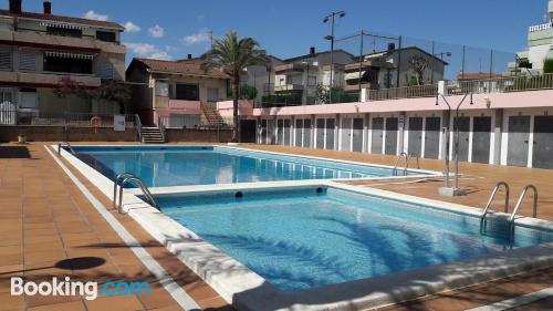 Apartamento con piscina y aire acondicionado en Comarruga.