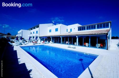 Appartement avec piscine et l'air. Punta Braccetto à vos pieds