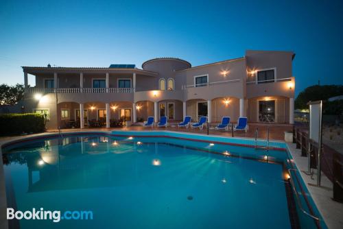 Tiny apartment with swimming pool and terrace.