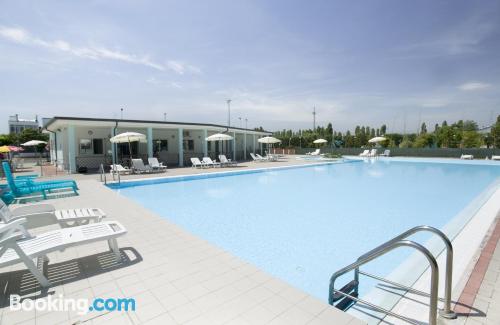 Appartamento con terrazza e piscina, a Lido Adriano